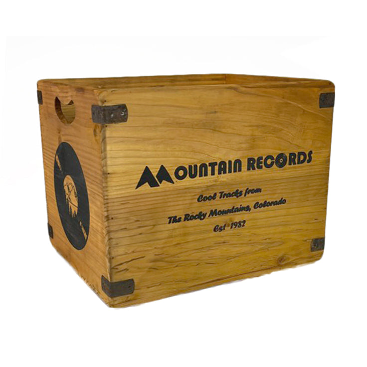 Two wooden storage crates with 'Mountain Records' branding on them, one large and one medium, both with metal handles.