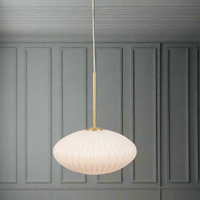 Milky white glass ribbed pendant.   An opaque glass pumpkin shaped pendant, perfect for a kitchen, or an island.  Great cloakroom light, lit with a warm led bulb to give the perfect muted glow to any room.