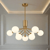 A stunning statement light that diffuses ample light around your home.  Nine opaque glass shades are suspended from beautiful brushed brass metal arms that are seamlessly attached to an adjustable or extendable brass rod
