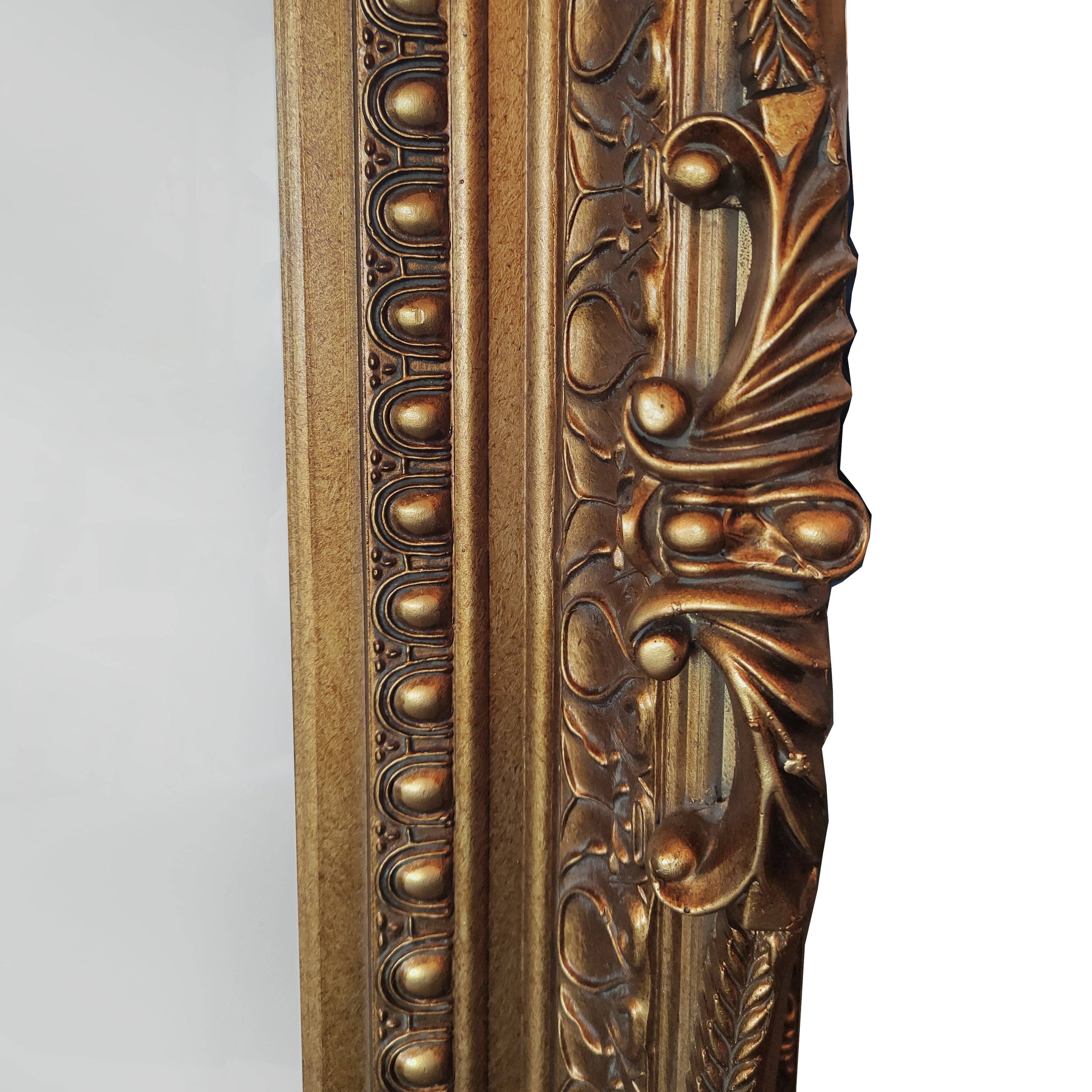 Ornate, burnt gold mirror, great overmantle size, can be placed vertically or horizontally. Classic carved frame to add a touch of opulence to any wall.