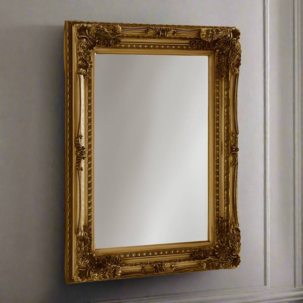 Ornate, burnt gold mirror, great overmantle size, can be placed vertically or horizontally. Classic carved frame to add a touch of opulence to any wall.