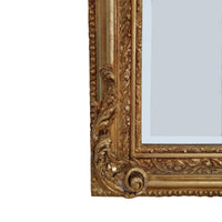 An elaborate mirror, framed with swags, garlands, acanthus leaves and other embellishments in the Georgian neoclassical style, exceptional quality with a beautifully carved wooden frame.  Over a console table in your hall, over a period marble or metal fireplace in a living room as a luxurious addition to your bedroom or dressing room, wherever you place this mirror it will enhance your interior adding a touch of luxury.
H: 158 cm W: 85 cm D: 13 cm