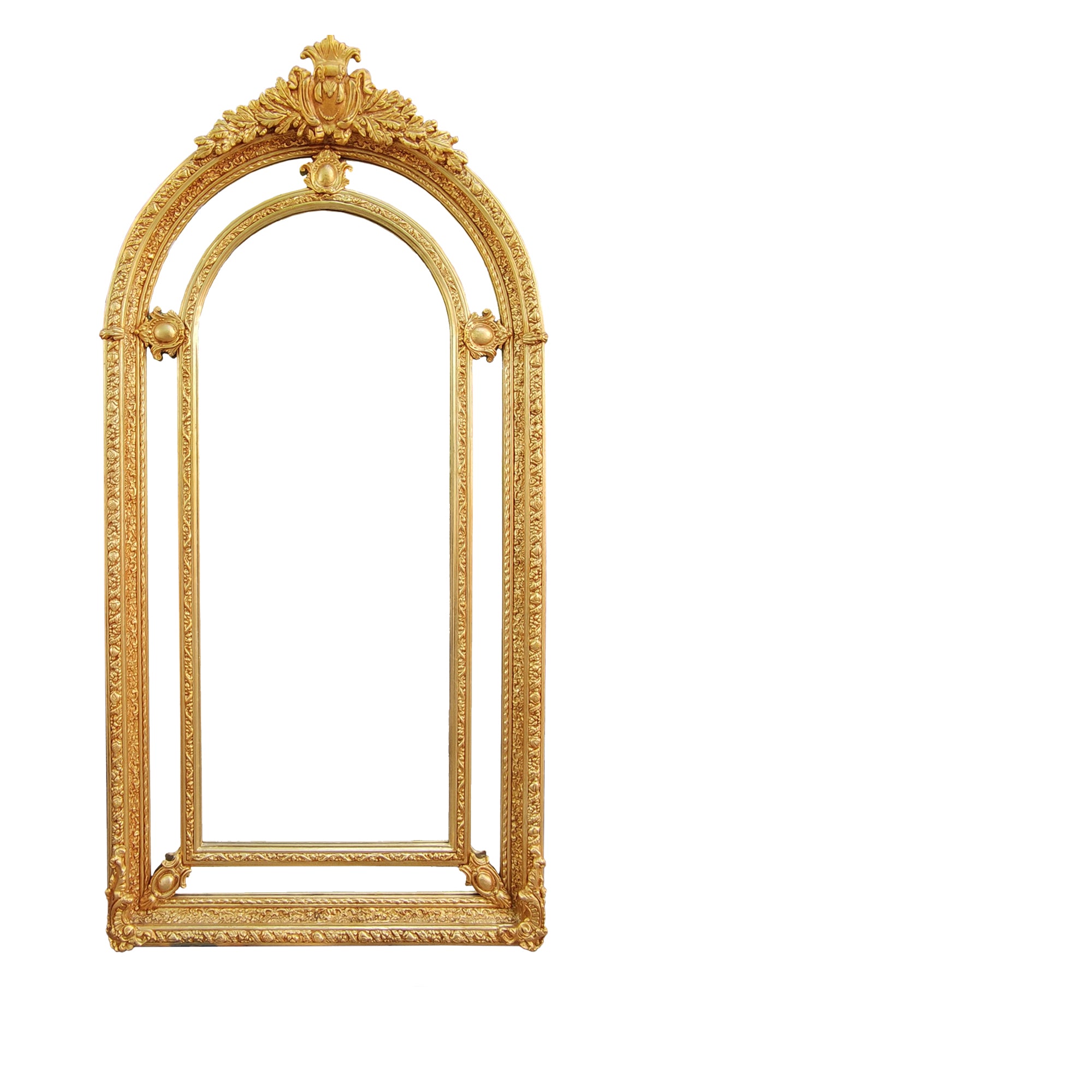 Extremely ornate arched gold mirror with beveled panels.  This statement mirror would look amazing in a hallway, just opening up the space and adding a luxurious air to your entryway. In a living room to flash out light and give the illusion of extra space.  Stunning rococo revival style with swags and medallions to the crown and heavily ornamented frame. The gilding is a beautifully opulent gilt leaf giving the frame an opulent lustre.  
There is no room in the house that would not ben