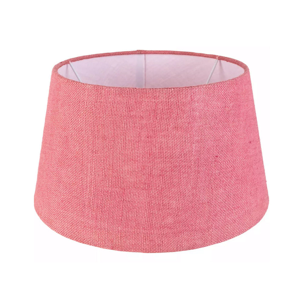 Pink linen fabric shade. A new shade can update the most boring of lamp bases, giving a new, fresh look to any room. This lampshade is perfectly suited for most small to medium lamp bases, making it a versatile choice for living rooms or bedrooms. Its pink hue adds a pop of color that brightens the room, while its natural linen composition provides an elegant look.