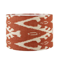A beautiful red cotton ikat patterned shade. It can be used as a ceiling pendant shade or in a table lamp.