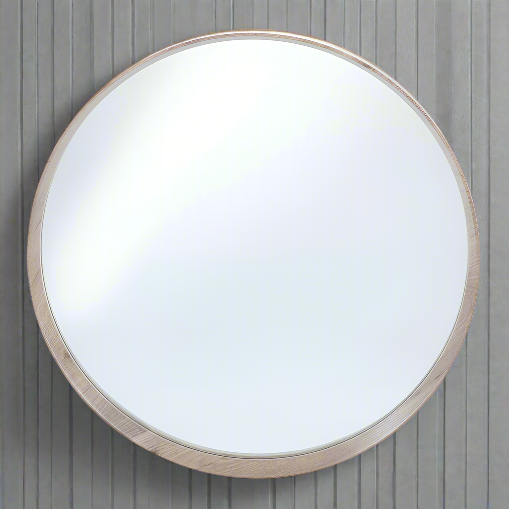 Scandi pale wooden framed round mirror for a light and airy feel to any room.  The pale colour of the wood and the deep frame of the mirror make this the perfect mirror for a kitchen or dining room.
