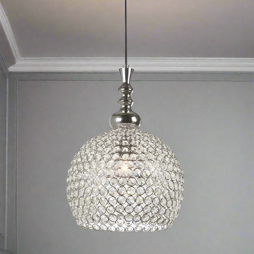 A really sparkly crystal disc pendant, give a high end look on a smaller scale, great bedroom, hall, any smaller space that needs a lift.  The size and shape of this pretty crystal light works well in a smaller space giving the glamour of crystal in a more compact size.