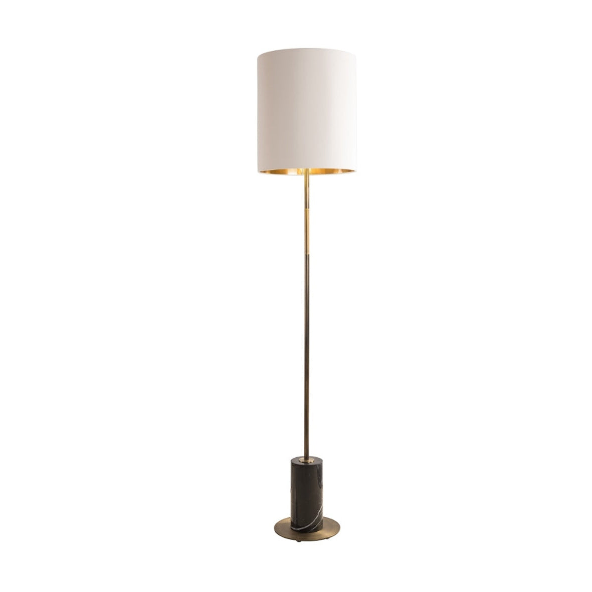 Very tall, simple, slim profile antique brass floor lamp se in a black marble base. This is the floor lamp you need in an uncluttered space, the tall white shade adding a glow from a gold inner sat on a very slim pole and marble base. Stunning in a corner of your home. 
Topped with a cream shade, with gold inner.