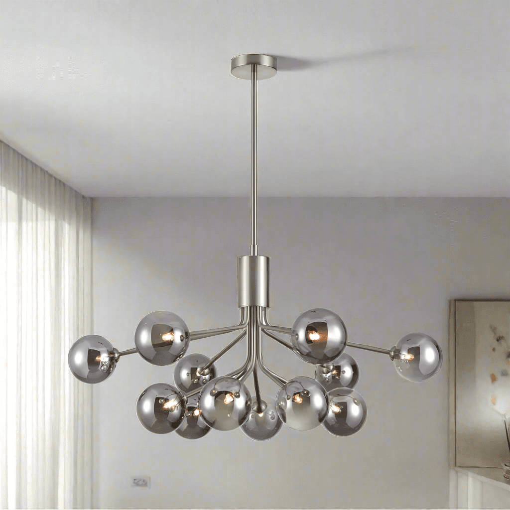 A 12 globe light on a satin nickel frame, large statement light spreading a glow over your room. 2 150 cm Rods and 2 300 cm rods provided to add to the height of this light.