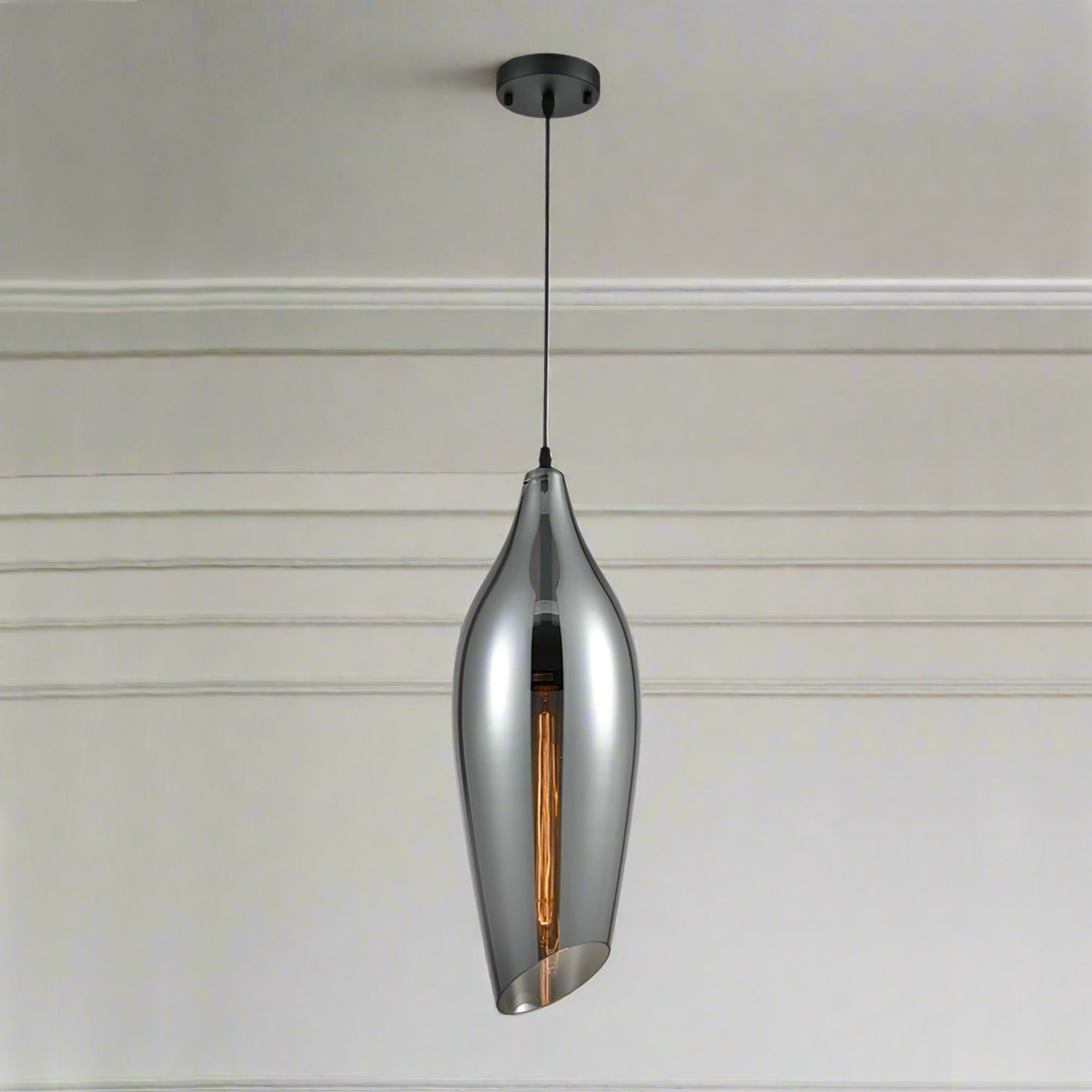 Extra long Aerial smoked glass pendant , perfect island pendant.  Long asymmetric design  contemporary, angled cut glass, subtle colouring, stunning in any setting. These jewelled coloured lights are perfect over a kitchen island.
Min drop: 70 cm Max drop:  336 cm