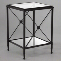 Square, black metal and tempered glass. One of our favourite side tables, we have them in the brass finish but now they come in black, perfect for a contemporary home. A classic metal and glass cross legged side or sofa table.