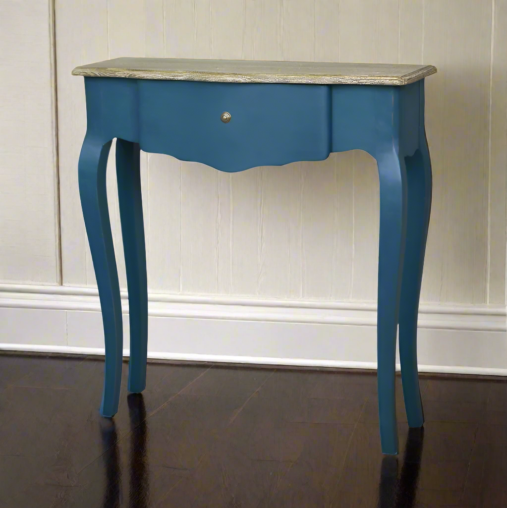 A superior quality wooden console table slender enough for small nooks, hallways odd wall areas between doors. Painted in an elegant modern blue, Farrow and Ball Stiffkey colour, this useful side table perfectly complements any room decor and makes a home feel more homely without taking up any valuable space.