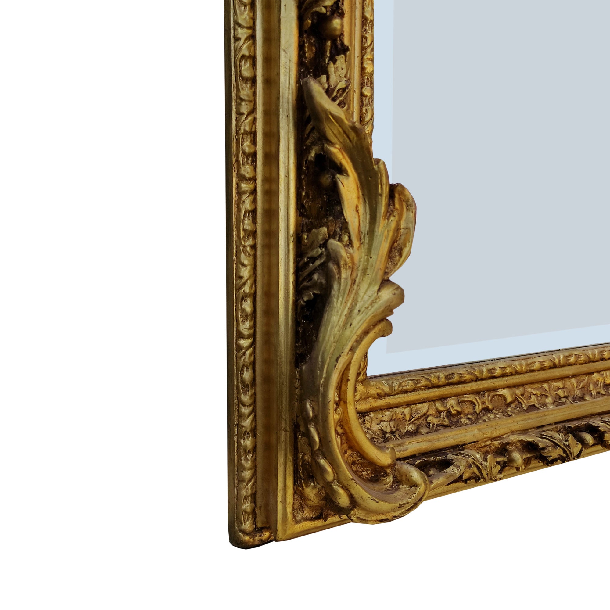 Ornate gilt wood mirror, with carved frame and topped with a pair of cherubs holding a medallion.  Highly decorative mirror in the 'Georgian' style, perfect in a hall, over a fireplace in a living room or as a stunning addition to your bedroom or dressing room.  These mirrors work well in a period country home as well as adding that luxurious touch to a town home. 
H: 180 cm W: 100 cm D: 16 cm