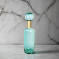 Extra tall teal apothecary bottle with gilt band.  A modern, stylish accessory to any room. An easy way to add colour to a contemporary interior.