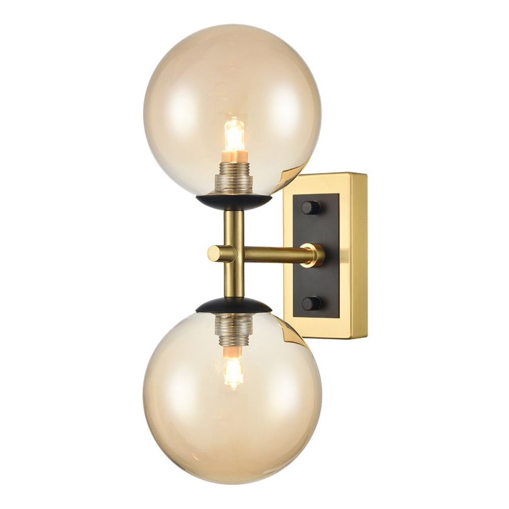 Stylish aged brass and matt black metal globe wall light  fixtures with two tinted glasses It creates an instant classy and elegant feel. With an IP Rating 44, this globe wall light can be use in the bathroom transforming your space with a glamorous look. Perfect bathroom lighting but globe wall lights look just as stunning in a hall or living room.