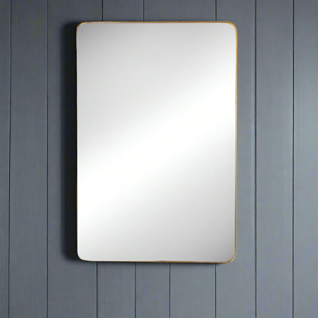 The slim gilt frame on this mirror just accentuates the beauty of large glass, a lot of mirror in a simple, elegant, rectangular frame.  This mirror suits any room whether hung vertically or horizontally will add light, from every direction to any room.