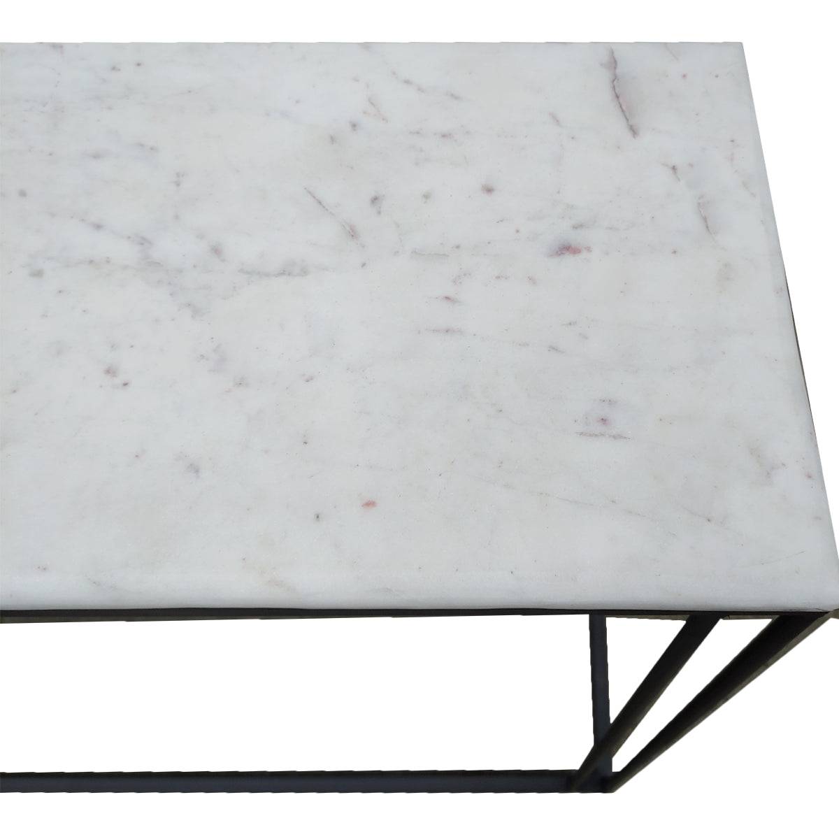 Marble topped console tables on a black iron metal base. These sturdy pieces where the white marble contrasts stunningly against simple black iron legs.
