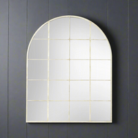 Rubbed, aged, white painted framed arch window mirror.