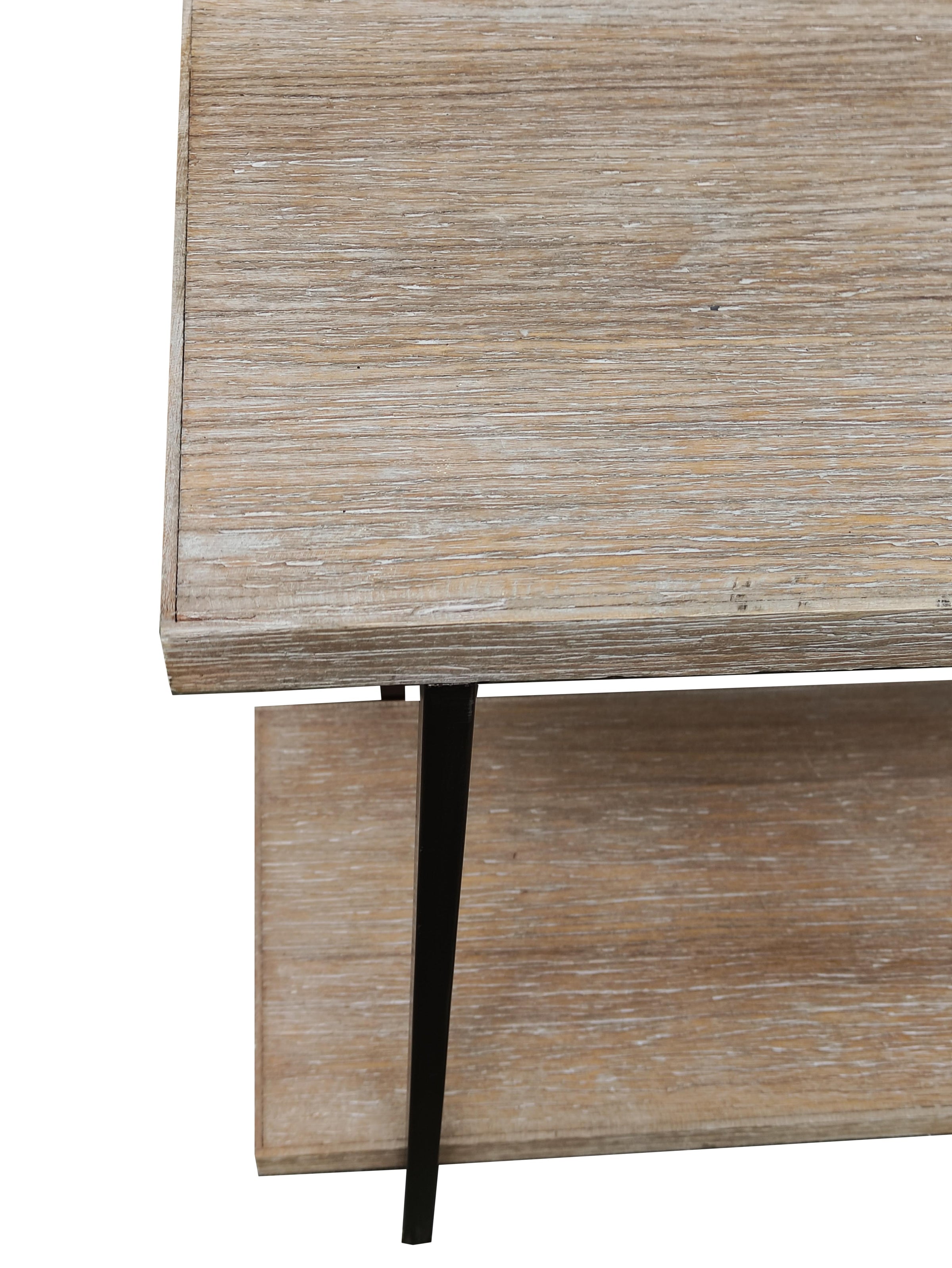 A really long wooden topped console table with useful bottom shelf. Set on a black iron frame. A fantastic hall or sitting room table for display and storage.  A striking piece that is so simple but would elevate any space in a contemporary or a period home. It has an open and airy design emphasizing functionality and clean lines and would look stunning in a hall with a large mirror. This table is now out of stock and we only have thei one left as a reduced price.
One remaining - REDUCED FROM £59