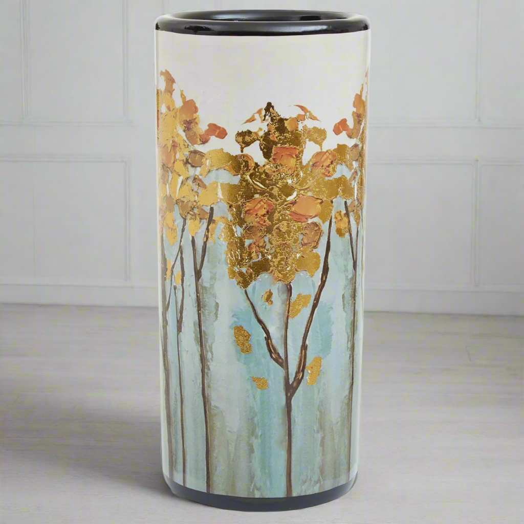 A really beautiful, arty umbrella stand painted in a naturalistic floral pattern with gold leafing to the tops of the flowers. In a mixture of pale blues, browns and gold leaf a stunning piece.
H: 45 cm D: 20 cm.