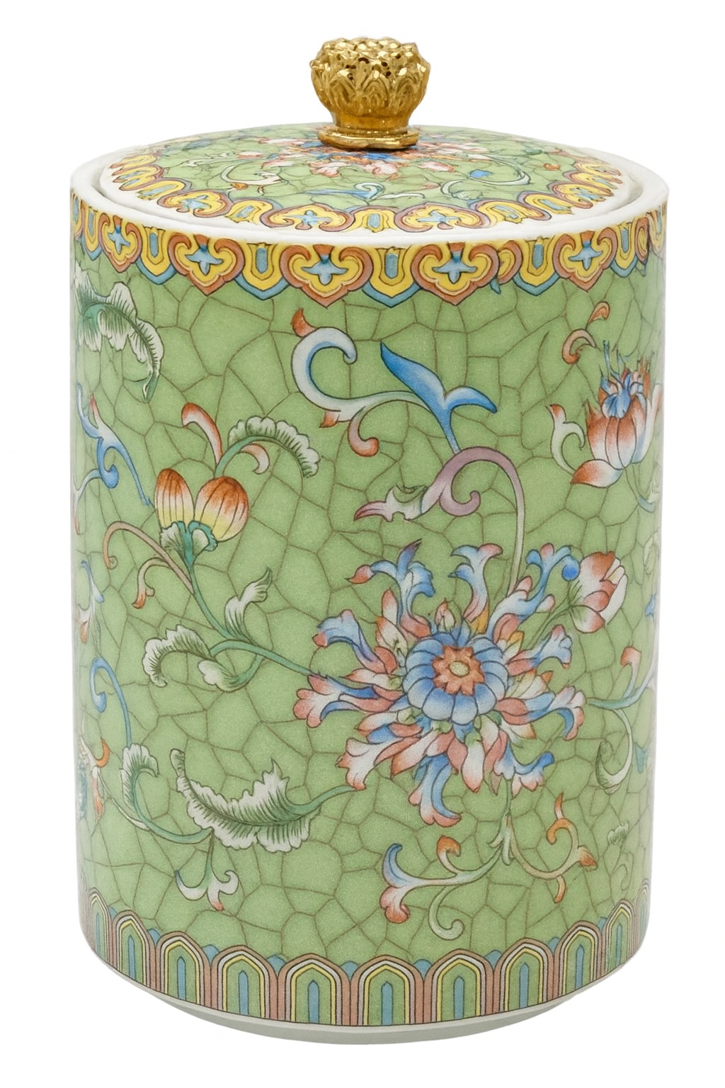 Handcrafted green ceramic scented candle jar with gold detailing and floral pattern, scented with warm amber, florals, and woods.