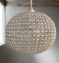 Extra large brass crystal globe chandelier with crystal beading encased in brass metalwork that reflects a pretty pattern around your ceiling and walls. A classic and glamorous ceiling light which compliments all types of decor. Creating a dazzling effect as light refracts through the crystals. Globe chandeliers look perfect in a hallway, adding glamour to a living room. Globe chandeliers are neat and simple in a bedroom.