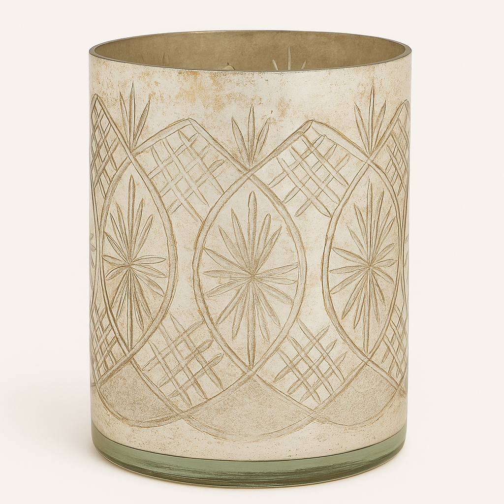 Large mercury glass candleholder for a festive table setting.