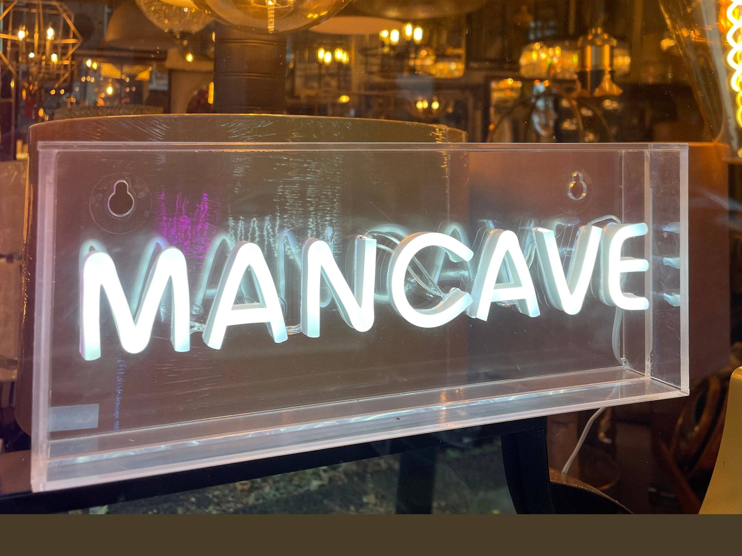 Acrylic neon wall sign "Mancave" on a box frame. A perfect retro look.
It comes with an USB cable with dimmer switch.