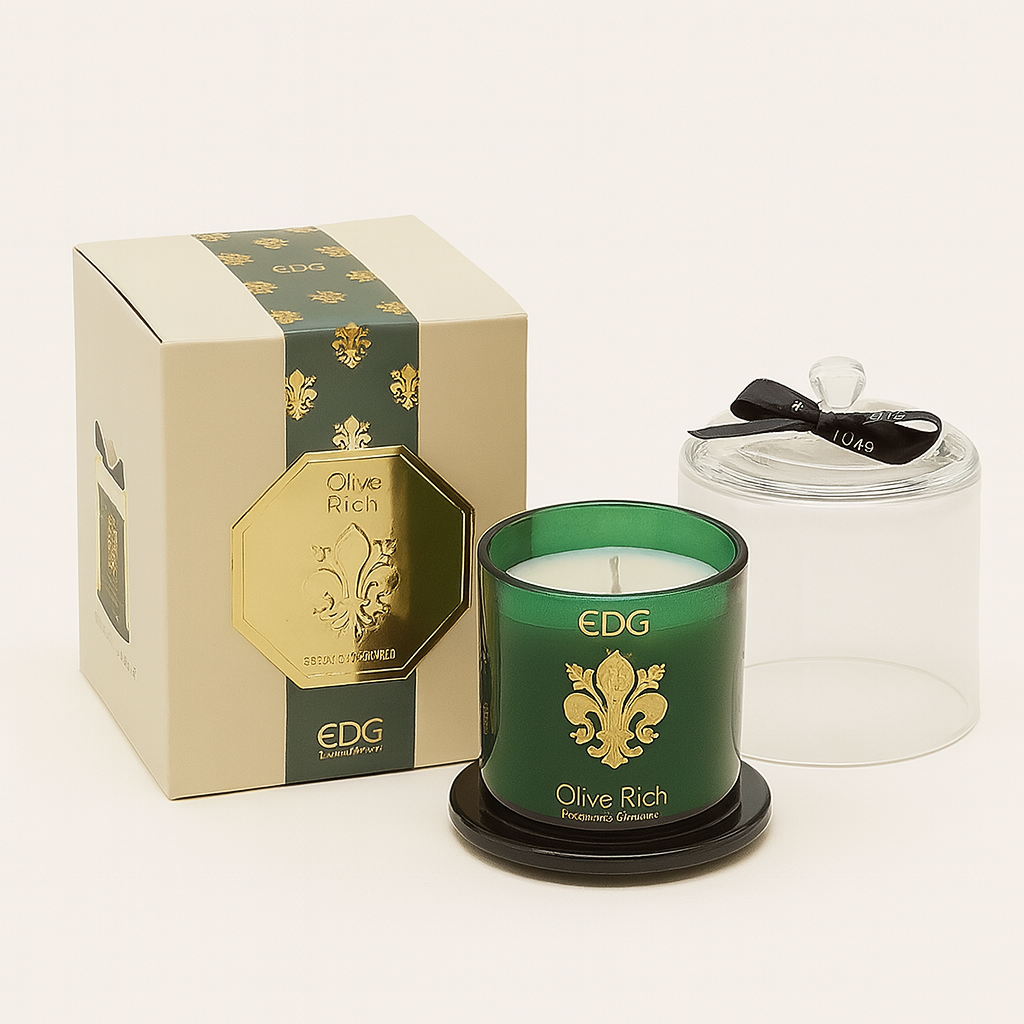 Olive Rich luxury scented candle in green glass with gold detailing and a clear cloche, presented with a matching gift box.