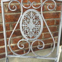 Three piece folding, light grey painted patio set, table and two chairs  with rust detail effect giving this a vintage look. Enjoy garden dining with this patio set.