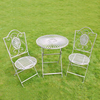 A three piece garden furniture set comprising a round table  and two open lattice work chairs in a distressed grey colour (the close-up images of this set are a better representation of the colour than the main image).  Perfect size for a small garden, patio or even a balcony. The set is constructed in powder coated iron for weather resistance and durability. The three pieces can be folded down for easy storage.