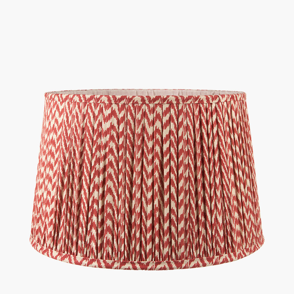 Beautifully pleated, chevron patterned lamp shade in red and off white colouring.
Available in 5 sizes.
