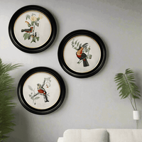 Round small red birdwall print in a classic black and gilt frame, this print will make an impact on any wall. The style is reminiscent of ornithological illustrations with its vibrant colours.
