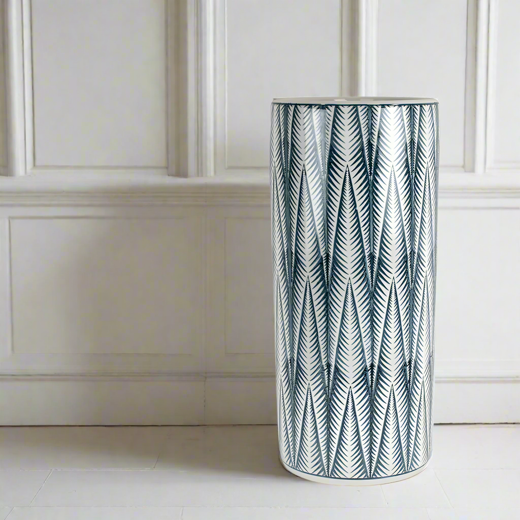 A beautiful vintage style ceramic umbrella stand which can also be used as a tall vase or pot for plants or foliage.  This porcelain piece will make your home feel homely and welcoming and add a touch of colour pop into your space.  Perfect accessory for your hall, Check our website for a larger selection of Ceramic Umbrella Stands plenty for you to choose from.