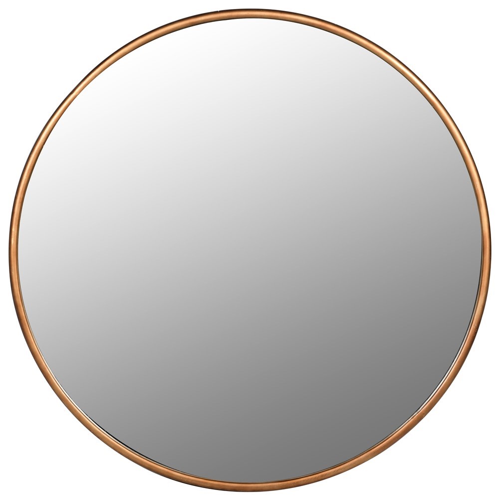 A supersized statement circular mirror finished in an antique brushed gold gilt solid metal frame.  This beautiful mirror is stunning for it's simplicity, and maximum glass effect.  It illuminates the space while softening sharp corner edges resulting in a light airy feel to any room.