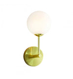 <p>Brushed gold wall light with opal shade.  <br></p> <p>W: 12 cm D: 14 cm H: 27 cm</p> <p data-mce-fragment=