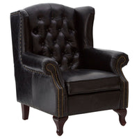 A replica of a typical Victorian button back armchair, in black leather with antique studding. Large and immensely comfortable. A great 'Gentlemen's Club' chair for the home. 