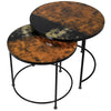 Round coffee table with pattern glass top and iron metal legs.