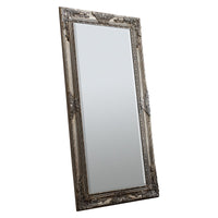 A large decorative wood framed full length mirror in a hand applied silver leaf finish.
It can be hung in Portrait & Landscape orientation.