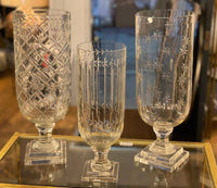 Tall Cut glass hurricane lamp with star decoration. Large decorative candle holders.