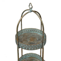 A unique and very pretty shelf unit with pierced metal detailing around shelves that can be lifted out and also used as trays.  Finished in a rustic antique gold, this furniture piece has Moroccan vibes with five shelves encased in an outer frame that can fold flat.  
This is a useful storage solution for rooms that need decluttering. Can be used in any space and looks particularly glamorous in bathrooms and conservatories. 