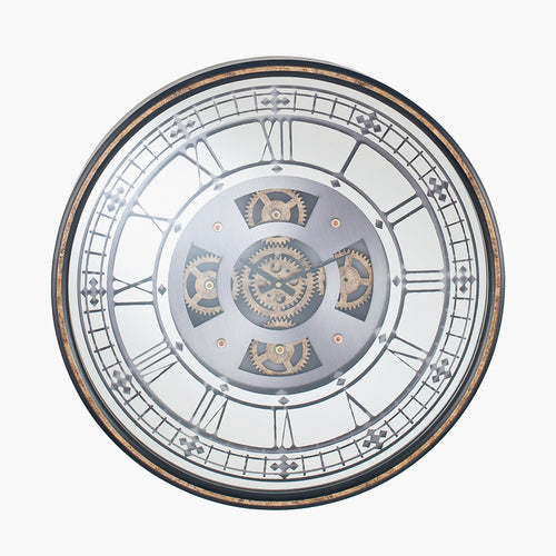 Wall clock with moving cogs and an antiqued face. black metal rim with gold inset. A great moving clock, large enough to be a real statement.