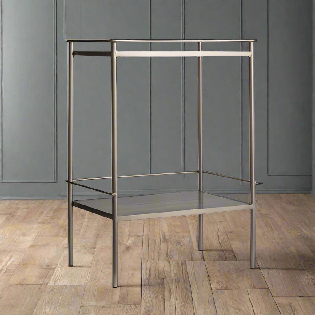 A side table with a marble top and a shelf in a soft champagne metal finish. A luxurious addition for any room.