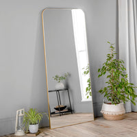 Tall, gold leaner mirror with a minimal frame and lot of mirror !!! Perfect to lean against a bedroom or dressing room wall. It will add glamour and extra light to your room.
Made to order in other colours, black or silver minimal frames,