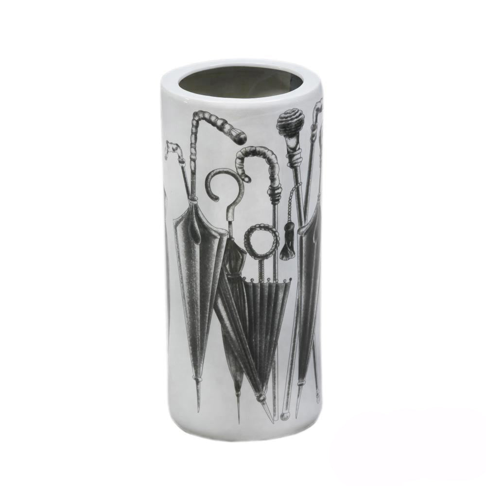 White ceramic umbrella stand.  A useful storage solution for your hall or porch to tidy and store all your umbrellas and sticks. 