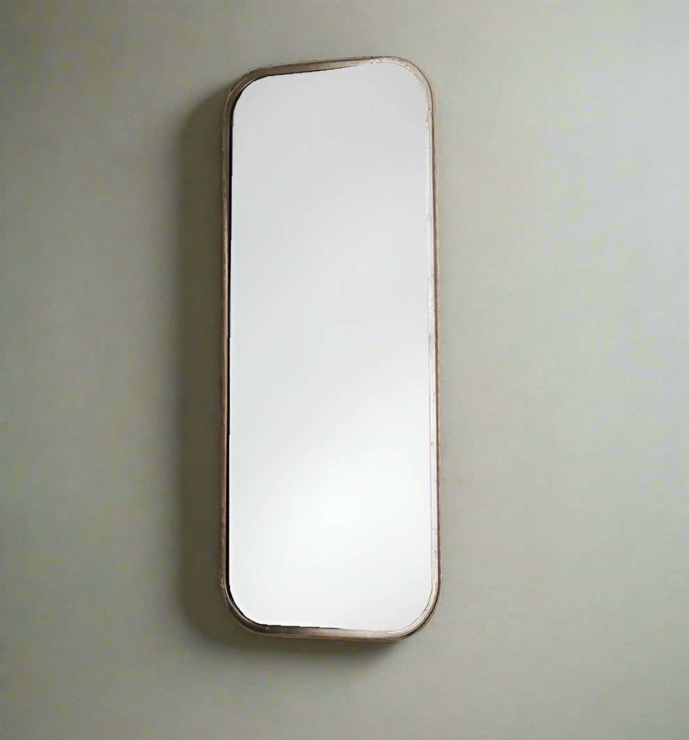 Large mirror with curved corners in a champagne gold colour.  Perfect dressing room or bedroom mirror, allowing you a full length view.  This large mirror will add light and perspective to your space.