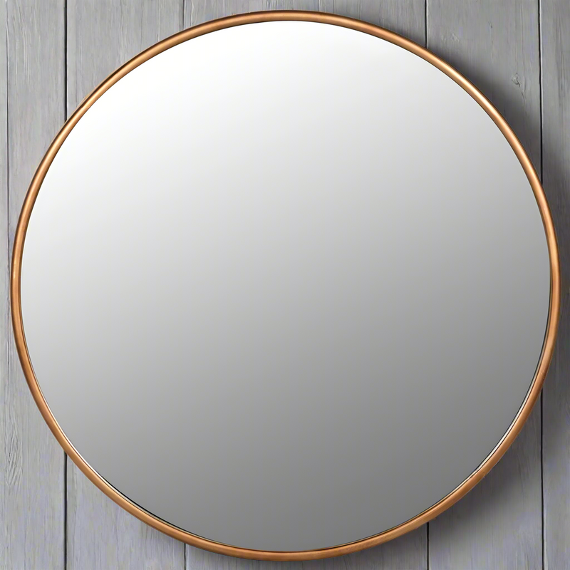 A supersized statement circular mirror finished in an antique brushed gold gilt solid metal frame.&nbsp; This beautiful mirror is stunning for it's simplicity, and maximum glass effect.&nbsp; It illuminates the space while softening sharp corner edges resulting in a light airy feel to any room.&nbsp; We've seen this massive mirror in many different rooms, over a fireplace in a living room, in the kitchen, dining room and bedroom, looks amazing anywhere.


W: 120 cm