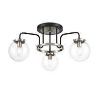 3 Glass globe semi- flush industrial style light, set in nickel metal frame. This semi-flush pendant it in a black and nickle finish so would look just as stunning in a contemporary home.