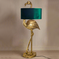 .So unusual, a stunning tall flamingo light with a vibrant green velvet, oval shade. The flamingo is the perfect creature to base a floor lamp on, tall, slim, elegant creature, perfect lamp for your hall or as a feature in your living room.


H: 142 cm W: 55 cm