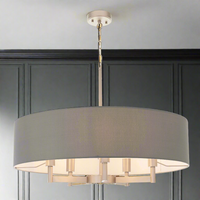 Large grey fabric shade on a 4 arm brushed nickel chandelier, a soft muted finish giving a sophisticated finish to your room. Perfect living room light to give a muted, soft light.